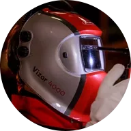 Welder using Fronius welding helmet Vizor 4000