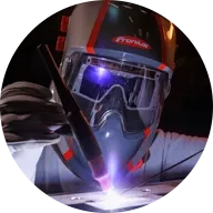 Welder using Fronius welding helmet Vizor