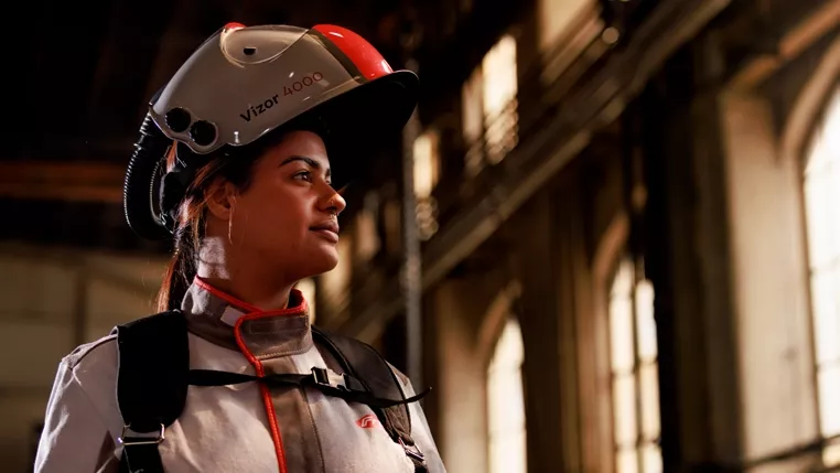 Woman with Fronius welding helmet