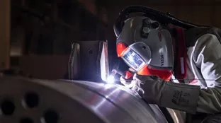 TIG welder with Fronius welding helmet